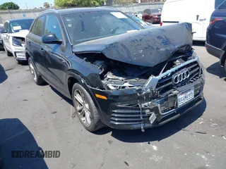 2018 Audi Q3 Premium z VIN WA1BCCFS3JR027565, wystawiony jako IAAI lot #42359553 z przebiegiem 39 921 mil mil oraz . Historia ofert i sprzedaży dostępna na DreamBid. Obrazek 1.