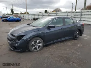 2021 Honda Civic Sedan LX with VIN 2HGFC2F69MH502002, listed as a Copart auction lot 52882605 with 0 mi miles and Salvage Title. Bid and sale history available at carsss.com. Image 1.