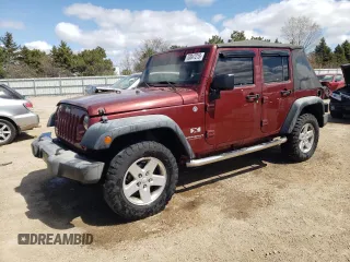 2008 Jeep Wrangler Unlimited X with VIN 1J8GA391X8L592843, listed as a Copart auction lot 53047215 with 239,726 mi miles and Salvage Title. Bid and sale history available at DreamBid. Image 1.