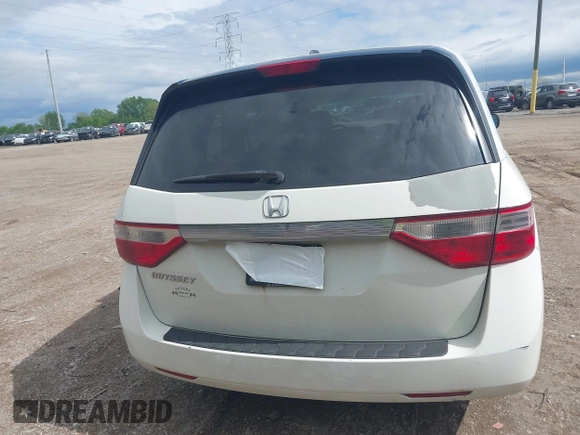 2012 Honda Odyssey EX-L with VIN 5FNRL5H63CB117341, listed as a IAAI auction lot 42197815 with 256,544 mi miles and . Bid and sale history available at DreamBid. Image 16.