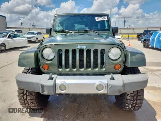 2008 Jeep Wrangler Unlimited Sahara with VIN 1J4GA59148L608970, listed as a Copart auction lot 64433495 with 134,055 mi miles and Salvage title. Bid and sale history available at DreamBid. Image 5.