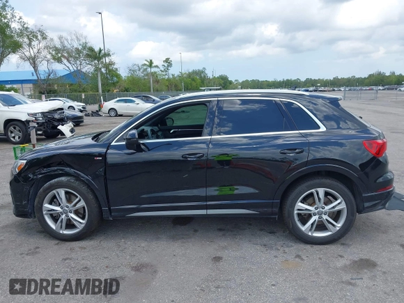 2020 Audi Q3 S line Premium Plus with VIN WA1EECF33L1052774, listed as a IAAI auction lot 42199200 with 55,008 mi miles and . Bid and sale history available at DreamBid. Image 14.