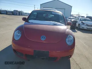 2010 Volkswagen Beetle with VIN 3VWRG3AL1AM005636, listed as a Copart auction lot 44068415 with 57,056 mi miles and Salvage Title. Bid and sale history available at DreamBid. Image 5.