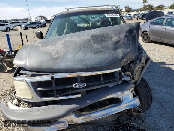 1998 Ford F-150 с VIN 1FTZX18W4WKA79557, выставлен на аукционе Copart как лот 48406375 с пробегом 192 577 миль миль и Списание • Salvage title. История ставок и продаж доступна на DreamBid. Изображение 5.