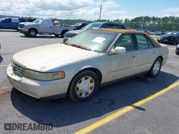 2001 Cadillac Seville Luxury SLS z VIN 1G6KS54Y81U110047, wystawiony jako IAAI lot #42436746 z przebiegiem 107 360 mil mil oraz . Historia ofert i sprzedaży dostępna na DreamBid. Obrazek 2.