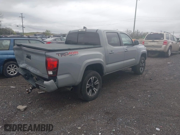 2019 Toyota Tacoma SR z VIN 3TMCZ5AN1KM206969, wystawiony jako IAAI lot #41951159 z przebiegiem 94 875 mil mil oraz . Historia ofert i sprzedaży dostępna na DreamBid. Obrazek 4.