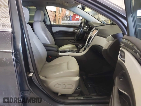2013 Cadillac SRX Performance Collection with VIN 3GYFNHE37DS530908, listed as a IAAI auction lot 41662796 with 80,254 mi miles. Bid and sale history available at carsss.com. Image 5.