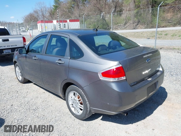 2010 Ford Focus SE with VIN 1FAHP3FN7AW233123, listed as a IAAI auction lot 41892154 with 285,214 mi miles. Bid and sale history available at carsss.com. Image 3.