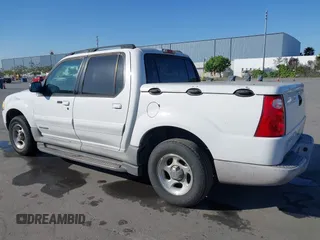 2002 Ford Explorer Sport Trac Value z VIN 1FMZU67E02UB39519, wystawiony jako IAAI lot #42151145 z przebiegiem 203 823 mil mil oraz . Historia ofert i sprzedaży dostępna na DreamBid. Obrazek 3.