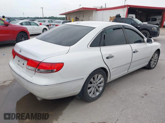 2009 Hyundai Azera Limited z VIN KMHFC46F39A358569, wystawiony jako IAAI lot #42294790 z przebiegiem 118 366 mil mil oraz . Historia ofert i sprzedaży dostępna na DreamBid. Obrazek 4.