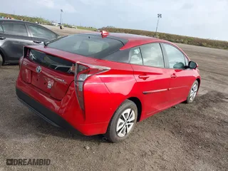 2016 Toyota Prius Four with VIN JTDKARFU9G3525328, listed as a IAAI auction lot 40791654 with 122,864 mi miles. Bid and sale history available at carsss.com. Image 4.