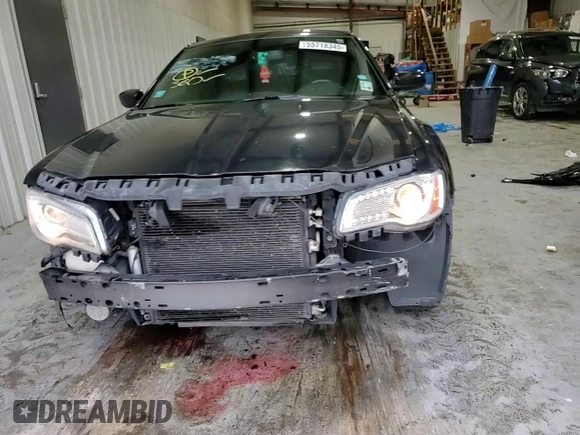 2013 Chrysler 300 z VIN 2C3CCAAG8DH727074, wystawiony jako Copart lot #55718345 z przebiegiem 92 228 mil mil oraz Szkoda całkowita • Salvage title. Historia ofert i sprzedaży dostępna na DreamBid. Obrazek 13.