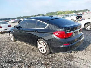 2013 BMW 5 Series GT 535i xDrive with VIN WBASP2C50DC338989, listed as a IAAI auction lot 42041585 with 121,429 mi miles. Bid and sale history available at carsss.com. Image 3.