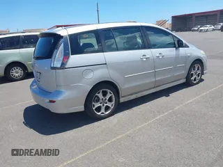2009 Mazda 5 Sport with VIN JM1CR293990334438, listed as a IAAI auction lot 42561953 with 118,178 mi miles and . Bid and sale history available at DreamBid. Image 4.