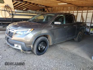 2020 Honda Ridgeline RTL-E z VIN 5FPYK3F74LB004391, wystawiony jako Copart lot #50100715 z przebiegiem 27 076 mil mil oraz Szkoda całkowita • Salvage title. Historia ofert i sprzedaży dostępna na DreamBid. Obrazek 1.