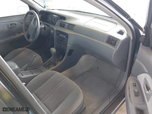 2000 Toyota Camry CE with VIN 4T1BG22KXYU923956, listed as a IAAI auction lot 41937950 with 101,539 mi miles. Bid and sale history available at carsss.com. Image 5.
