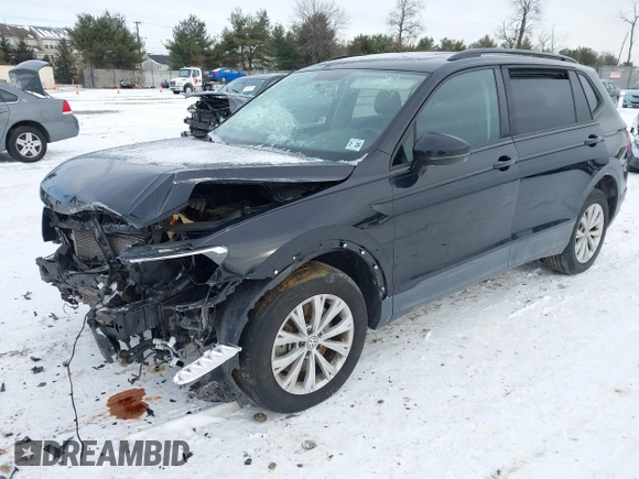 2020 Volkswagen Tiguan S with VIN 3VV0B7AXXLM080652, listed as a IAAI auction lot 41379678 with 46,330 mi miles and . Bid and sale history available at DreamBid. Image 20.