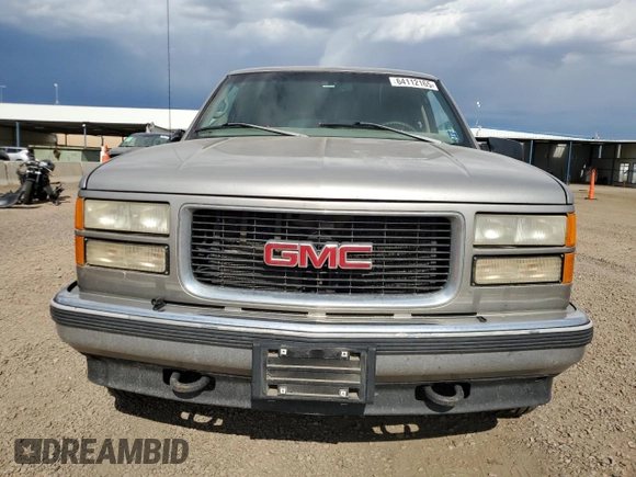 1998 GMC Suburban with VIN 1GKFK16RXWJ721305, listed as a Copart auction lot 64112165 with 197,756 mi miles and Clean title. Bid and sale history available at DreamBid. Image 5.