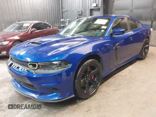 2022 Dodge Charger R/T with VIN 2C3CDXCT9NH127952, listed as a IAAI auction lot 42020401 with 55,483 mi miles and . Bid and sale history available at carsss.com. Image 22.