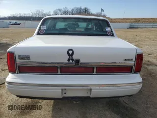 1997 Lincoln Town Car Signature z VIN 1LNLM82W1VY673577, wystawiony jako Copart lot #49160595 z przebiegiem 221 129 mil mil oraz Nie do naprawy • Non repairable. Historia ofert i sprzedaży dostępna na DreamBid. Obrazek 6.