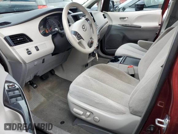 2014 Toyota Sienna LE with VIN 5TDJK3DC5ES075494, listed as a Copart auction lot 50102035 with 151,375 mi miles and Salvage Title. Bid and sale history available at DreamBid. Image 7.