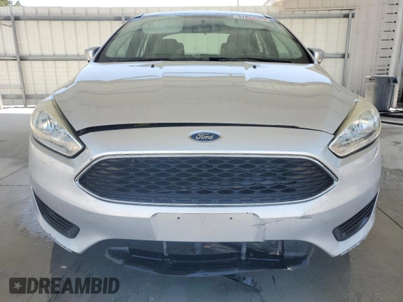 2016 Ford Focus SE with VIN 1FADP3F27GL336945, listed as a Copart auction lot 57811575 with 134,015 mi miles and Salvage title. Bid and sale history available at DreamBid. Image 5.