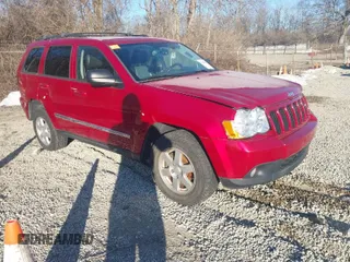 2010 Jeep Grand Cherokee Laredo with VIN 1J4PR4GK2AC135011, listed as a IAAI auction lot 41589996 with 111,536 mi miles. Bid and sale history available at carsss.com. Image 1.