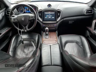 2017 Maserati Ghibli S z VIN ZAM57RSA3H1206281, wystawiony jako Copart lot #57846375 z przebiegiem 69 325 mil mil oraz Czysty tytuł • Clean title. Historia ofert i sprzedaży dostępna na DreamBid. Obrazek 8.