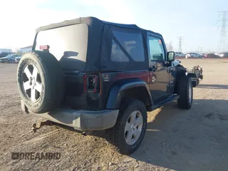 2007 Jeep Wrangler Sahara with VIN 1J4FA54167L204991, listed as a IAAI auction lot 42098918 with 236,845 mi miles and . Bid and sale history available at DreamBid. Image 4.