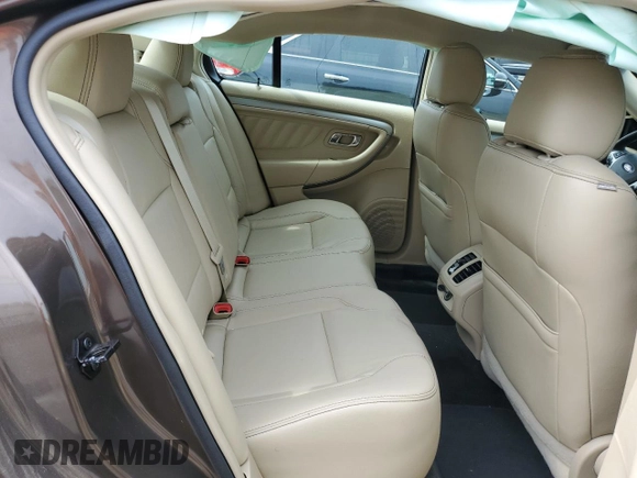 2015 Ford Taurus SEL with VIN 1FAHP2E89FG193926, listed as a Copart auction lot 61036375 with 23,963 mi miles and Salvage title. Bid and sale history available at DreamBid. Image 10.