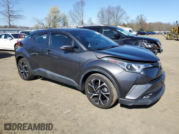 2019 Toyota C-HR XLE z VIN NMTKHMBX4KR084471, wystawiony jako Copart lot #52575985 z przebiegiem 54 578 mil mil oraz Szkoda całkowita • Salvage title. Historia ofert i sprzedaży dostępna na DreamBid. Obrazek 4.