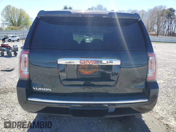 2015 GMC Yukon Denali with VIN 1GKS2CKJ5FR612147, listed as a Copart auction lot 49209525 with 127,262 mi miles and Salvage Title. Bid and sale history available at carsss.com. Image 6.