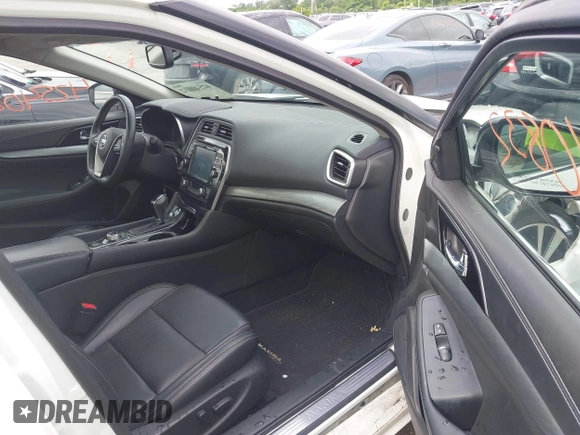 2018 Nissan Maxima SL with VIN 1N4AA6AP2JC395188, listed as a IAAI auction lot 42540832 with 106,898 mi miles and . Bid and sale history available at DreamBid. Image 5.