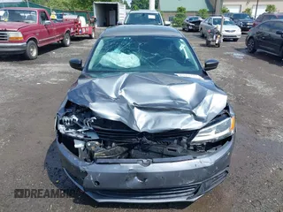 2013 Volkswagen Jetta S with VIN 3VW2K7AJ5DM285488, listed as a IAAI auction lot 42521944 with 132,655 mi miles and . Bid and sale history available at DreamBid. Image 6.