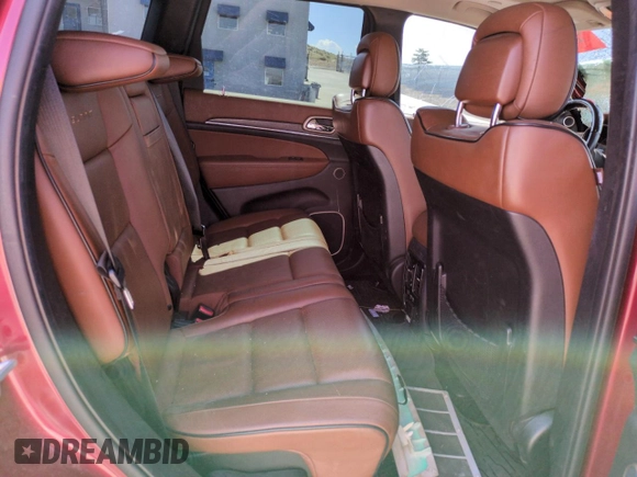 2015 Jeep Grand Cherokee Summit with VIN 1C4RJFJM6FC833687, listed as a Copart auction lot 59620695 with 110,074 mi miles and Salvage title. Bid and sale history available at DreamBid. Image 10.