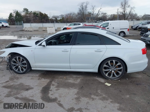 2014 Audi A6 Prestige z VIN WAUHMAFC6EN098487, wystawiony jako IAAI lot #41908034 z przebiegiem 146 298 mil mil oraz . Historia ofert i sprzedaży dostępna na DreamBid. Obrazek 14.