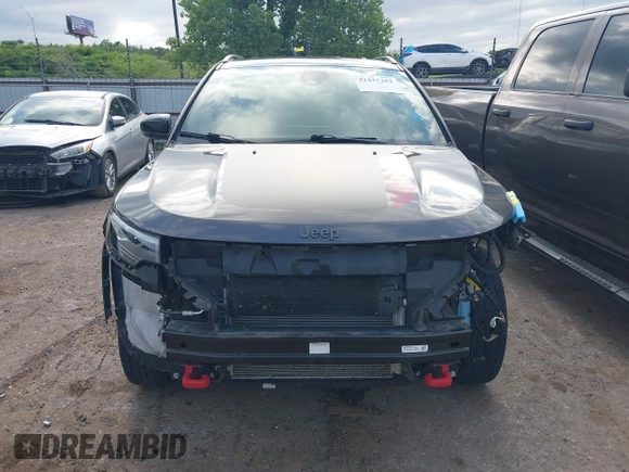 2023 Jeep Compass Trailhawk with VIN 3C4NJDDNXPT536872, listed as a IAAI auction lot 42437282 with 28,293 mi miles and . Bid and sale history available at DreamBid. Image 12.
