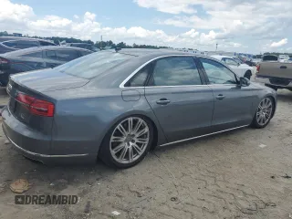 2015 Audi A8 4.0T with VIN WAU32AFD5FN040395, listed as a Copart auction lot 60909515 with 79,379 mi miles and Salvage title. Bid and sale history available at DreamBid. Image 3.