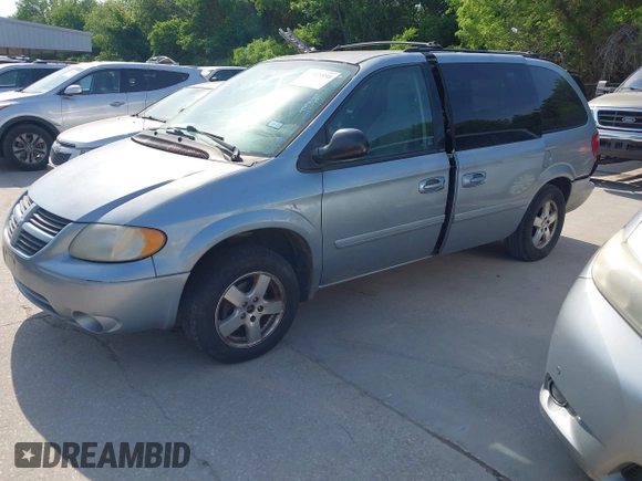 2005 Dodge Caravan SXT with VIN 2D4GP44L25R585797, listed as a IAAI auction lot 42025550 with 232,161 mi miles. Bid and sale history available at carsss.com. Image 2.