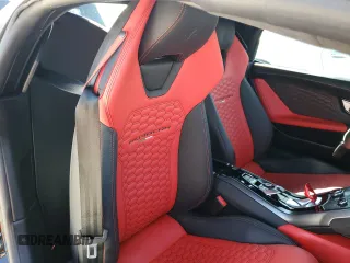2018 Lamborghini Huracan z VIN ZHWUR2ZF5JLA10561, wystawiony jako Copart lot #75416254 z przebiegiem Nie podano mil oraz Nie do naprawy. Historia ofert i sprzedaży dostępna na DreamBid. Obrazek 10.
