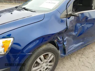 2014 Chevrolet Sonic LT with VIN 1G1JC6SB6E4134503, listed as a IAAI auction lot 41364166 with 124,225 mi miles. Bid and sale history available at carsss.com. Image 6.