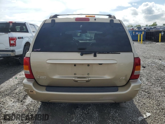 2000 Jeep Grand Cherokee Limited with VIN 1J4GW58N7YC327607, listed as a Copart auction lot 54711615 with 108,241 mi miles and Salvage title. Bid and sale history available at DreamBid. Image 6.