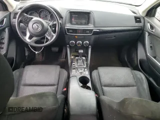 2016 Mazda CX-5 Sport с VIN JM3KE4BY4G0899953, выставлен на аукционе Copart как лот 57269035 с пробегом 196 158 миль миль и Списание • Salvage title. История ставок и продаж доступна на DreamBid. Изображение 8.