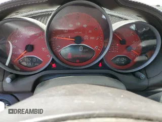 2006 Porsche Cayman S с VIN WP0AB298X6U784563, выставлен на аукционе Copart как лот 69819084 с пробегом 132 131 миль миль и Списание • Salvage title. История ставок и продаж доступна на DreamBid. Изображение 9.