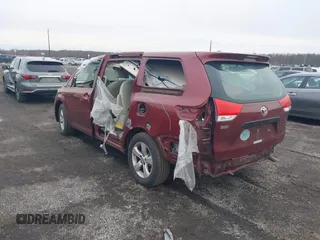 2014 Toyota Sienna L with VIN 5TDZK3DC8ES477402, listed as a IAAI auction lot 41494073 with 102,063 mi miles. Bid and sale history available at carsss.com. Image 3.