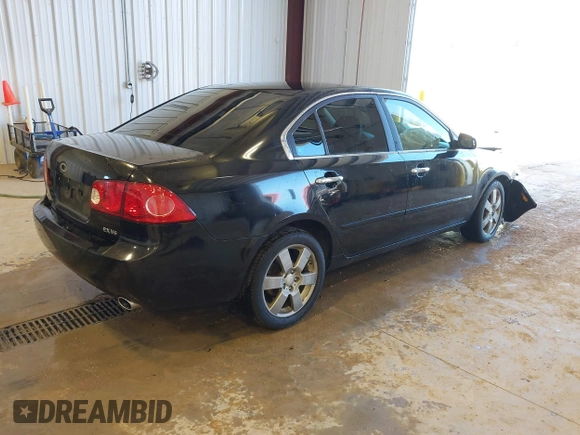2007 Kia Optima EX with VIN KNAGE124875134352, listed as a IAAI auction lot 41627381 with 183,053 mi miles. Bid and sale history available at carsss.com. Image 4.