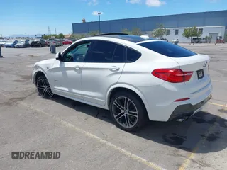 2015 BMW X4 xDrive28i with VIN 5UXXW3C5XF0M89147, listed as a IAAI auction lot 42779290 with 120,773 mi miles and . Bid and sale history available at DreamBid. Image 3.