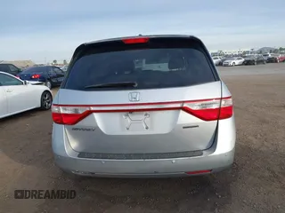 2012 Honda Odyssey Touring with VIN 5FNRL5H96CB095264, listed as a IAAI auction lot 41403450 with 246,199 mi miles and . Bid and sale history available at carsss.com. Image 16.