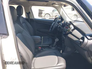 2016 MINI Hardtop 4 Door with VIN WMWXU1C56G2D10605, listed as a IAAI auction lot 42411431 with 35,367 mi miles and . Bid and sale history available at DreamBid. Image 5.