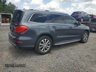 2014 Mercedes-Benz GL 450 z VIN 4JGDF7CE0EA303471, wystawiony jako Copart lot #58673045 z przebiegiem 182 455 mil mil oraz Tytuł czysty. Historia ofert i sprzedaży dostępna na DreamBid. Obrazek 3.